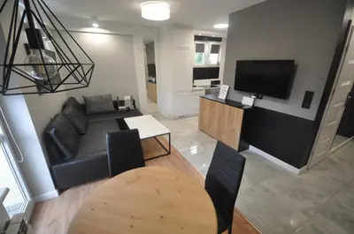 Telewizja i/lub zestaw kina domowego w obiekcie JDK Apartamenty Mickiewicza 34m2 4-osobowy