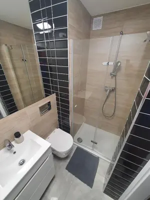 Łazienka w obiekcie JDK Apartamenty Mickiewicza 34m2 4-osobowy