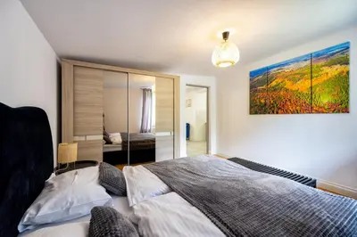 Łóżko lub łóżka w pokoju w obiekcie Apartamenty w Górach Sowich