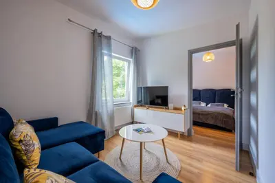 Telewizja i/lub zestaw kina domowego w obiekcie Apartamenty w Górach Sowich