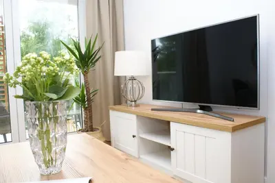 Telewizja i/lub zestaw kina domowego w obiekcie Apartament Green Park, Polanica Residence, garaż podziemny & mini SPA & Rowery