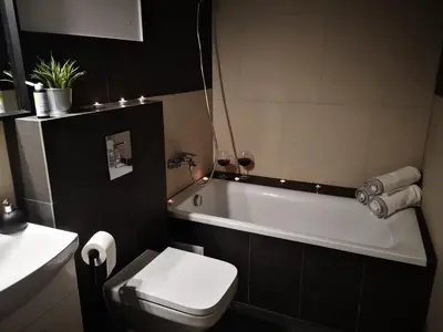 Łazienka w obiekcie Apartamenty LENA 3