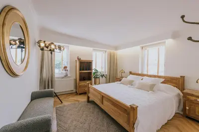Łóżko lub łóżka w pokoju w obiekcie Apartamenty Wrocławska 11