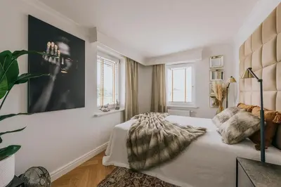 Łóżko lub łóżka w pokoju w obiekcie Apartamenty Wrocławska 11