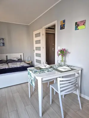 Łóżko lub łóżka w pokoju w obiekcie Elegant & Cosy