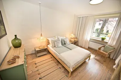 Łóżko lub łóżka w pokoju w obiekcie Apartament Nieoczywisty