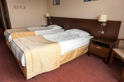 Łóżko lub łóżka w pokoju w obiekcie Hotel MOP Oleśnica Mała