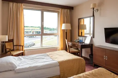 Łóżko lub łóżka w pokoju w obiekcie Hotel MOP Oleśnica Mała