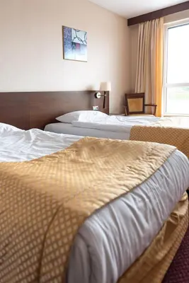 Łóżko lub łóżka w pokoju w obiekcie Hotel MOP Oleśnica Mała