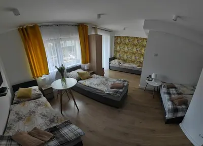 Łóżko lub łóżka w pokoju w obiekcie Agroturystyka Blicharzówka Noclegi