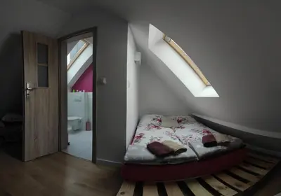 Łóżko lub łóżka w pokoju w obiekcie Agroturystyka Blicharzówka Noclegi