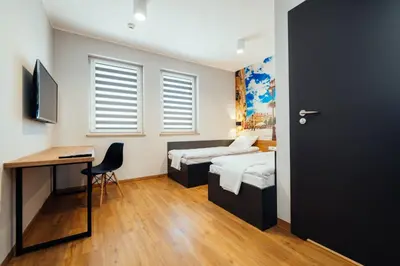 Telewizja i/lub zestaw kina domowego w obiekcie blue hotel