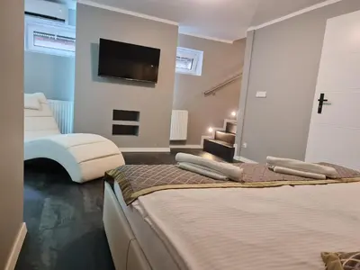 Łóżko lub łóżka w pokoju w obiekcie Apartament dwupoziomowy Kłodzko - Centrum