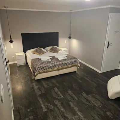 Łóżko lub łóżka w pokoju w obiekcie Apartament dwupoziomowy Kłodzko - Centrum