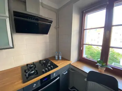 Kuchnia lub aneks kuchenny w obiekcie Klimatyczny apartament dla dwojga w sercu Starówki