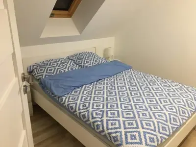 Łóżko lub łóżka w pokoju w obiekcie Osada Zdrojowa u Martyny