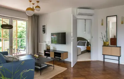 Łóżko lub łóżka w pokoju w obiekcie Apartament LUMOS by Pedro Polanica