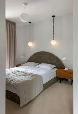 Łóżko lub łóżka w pokoju w obiekcie Apartament LUMOS by Pedro Polanica