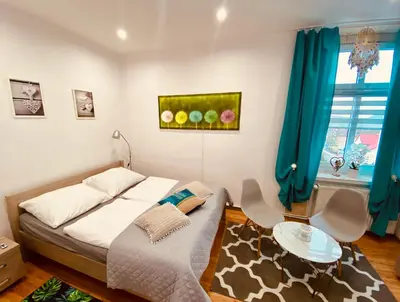 Łóżko lub łóżka w pokoju w obiekcie Apartament Przy Rynku