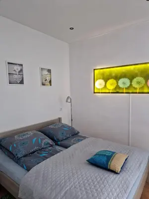 Łóżko lub łóżka w pokoju w obiekcie Apartament Przy Rynku