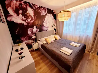 Łóżko lub łóżka w pokoju w obiekcie HO!HOUSE Legnicka