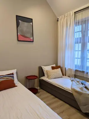Łóżko lub łóżka w pokoju w obiekcie RYNEK 30 Hostel