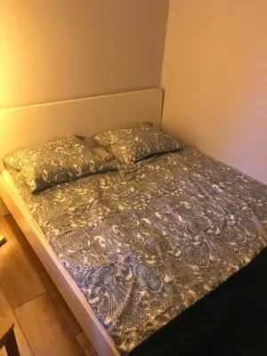 Łóżko lub łóżka w pokoju w obiekcie Zaciszny Apartament w Zdroju