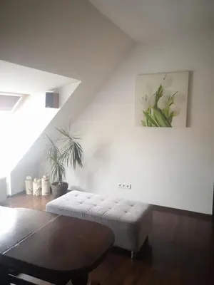 Łóżko lub łóżka w pokoju w obiekcie Apartamenty LENA 16 TWOJE poddasze