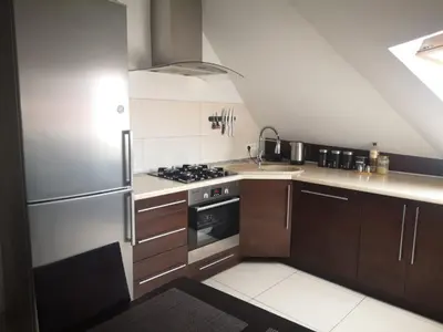 Kuchnia lub aneks kuchenny w obiekcie Apartamenty LENA 16 TWOJE poddasze