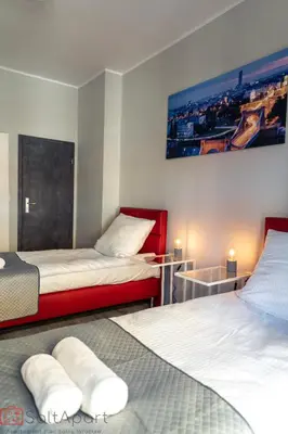 Łóżko lub łóżka w pokoju w obiekcie SaltApart Apartament Plac Solny Wrocław