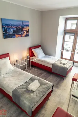 Łóżko lub łóżka w pokoju w obiekcie SaltApart Apartament Plac Solny Wrocław
