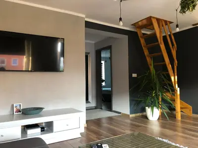 Telewizja i/lub zestaw kina domowego w obiekcie Apartament Moniuszki