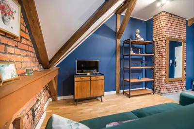 Telewizja i/lub zestaw kina domowego w obiekcie Uroczy Apartament Gliwice