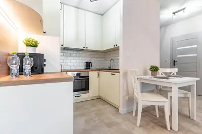 Kuchnia lub aneks kuchenny w obiekcie WrocApartments CityCenter - Parking Free