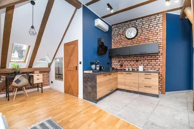 Kuchnia lub aneks kuchenny w obiekcie Przytulny Apartament Z Wieżą