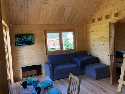 Telewizja i/lub zestaw kina domowego w obiekcie Chatka Uchatka