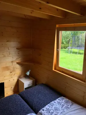 Łóżko lub łóżka w pokoju w obiekcie Chatka Uchatka
