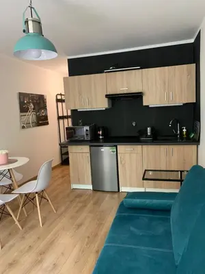 Kuchnia lub aneks kuchenny w obiekcie SEN na CICHEJ - Apartamenty w PARKU