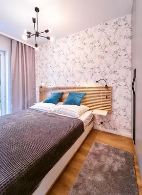 Łóżko lub łóżka w pokoju w obiekcie LAGUNA Apartament Polanica Residence 17