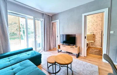 Telewizja i/lub zestaw kina domowego w obiekcie LAGUNA Apartament Polanica Residence 17