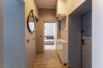 Łóżko lub łóżka w pokoju w obiekcie Apartament Silver
