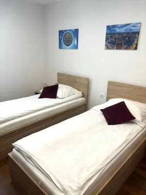 Łóżko lub łóżka w pokoju w obiekcie Apartament Residence Nysa