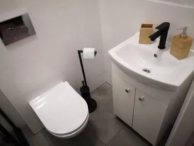 Łazienka w obiekcie Apartamenty LENA 2