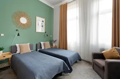 Łóżko lub łóżka w pokoju w obiekcie Golden Market Square - 3Rooms, 90m2 of Comfort & Quiet - AS HOME Apartamenty R502