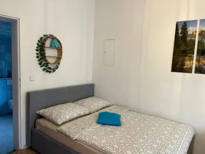 Łóżko lub łóżka w pokoju w obiekcie Bella Patria