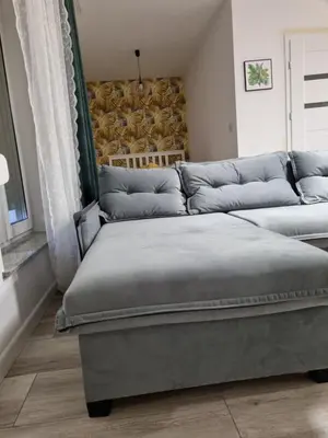 Łóżko lub łóżka w pokoju w obiekcie Apartament Uroczy