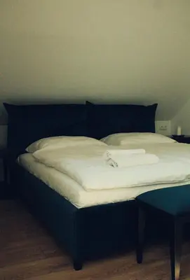 Łóżko lub łóżka w pokoju w obiekcie FORREST