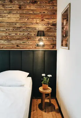 Łóżko lub łóżka w pokoju w obiekcie FORREST