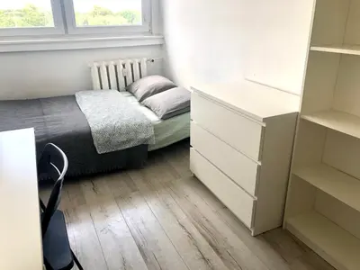 Łóżko lub łóżka w pokoju w obiekcie Blue River - Popowicka
