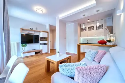 Telewizja i/lub zestaw kina domowego w obiekcie Apartament 26 Willa Ogrodowa